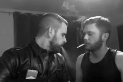 Two Muscular Guys Smoking And Kissing